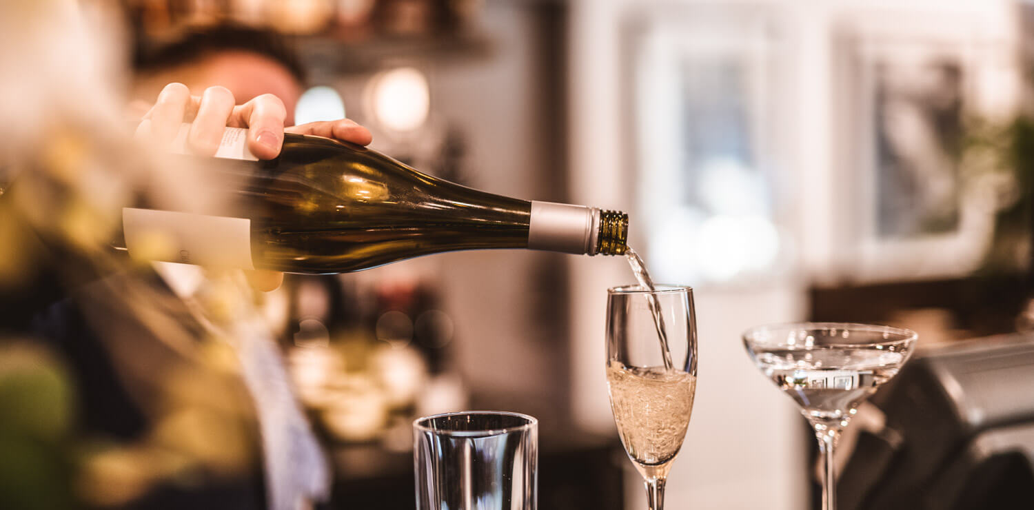 wine-being-poured-at-bar | The Savoy Hotel on Little Collins